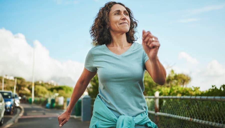 mature woman out for a power walk